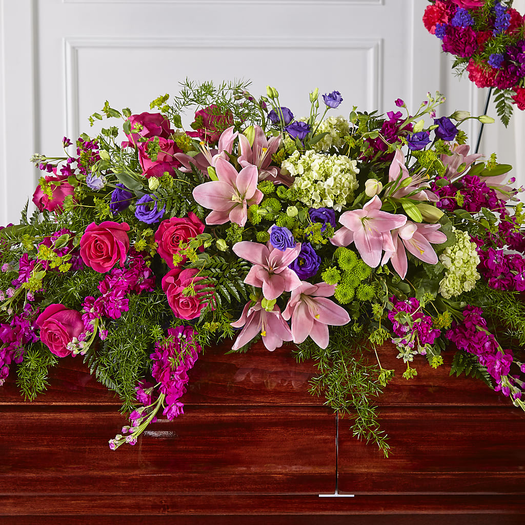 Radiant Tribute Casket Spray – Temptation Flower Shop, Wichita KS